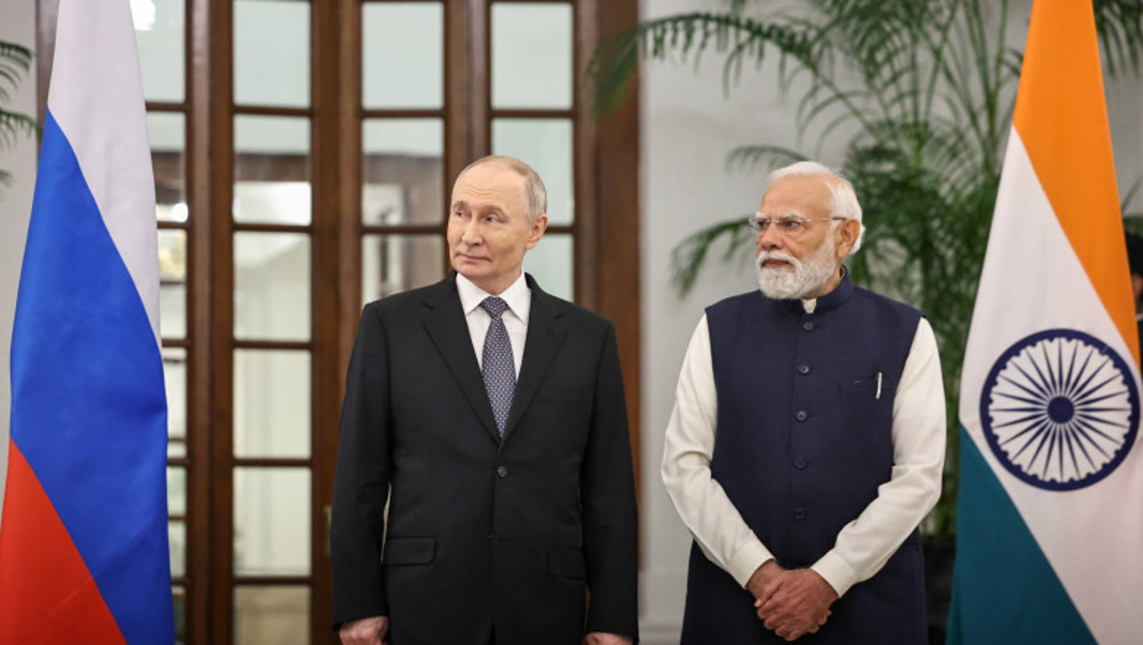Putin and Modi set $100 billion trade goal for India and Russia