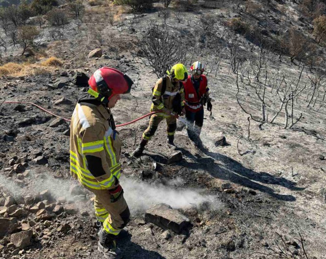 Moldovan firefighters tackle greece wildfire