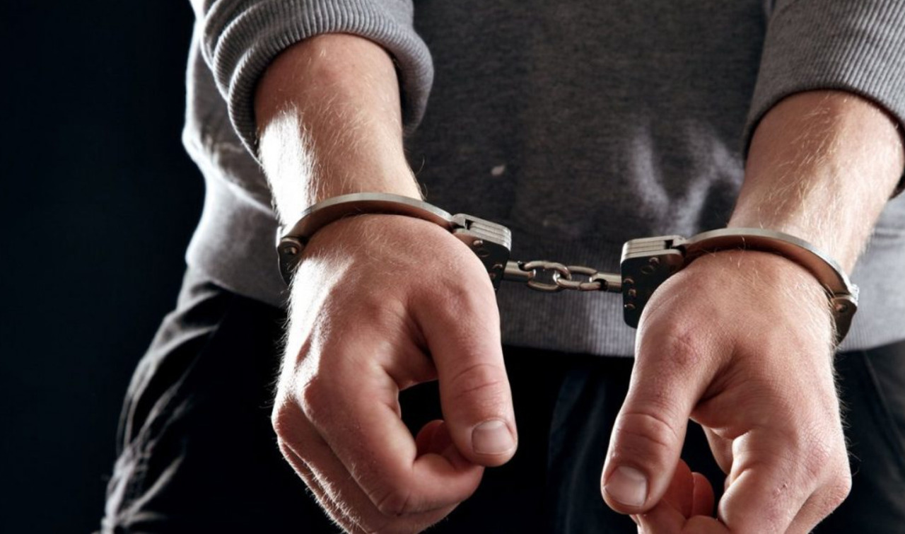 Two agents arrested for organizing mass riots