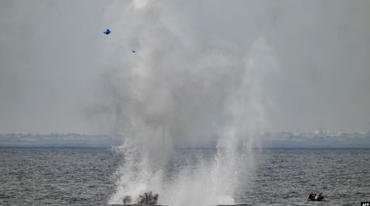 AFP / The Romanian military detonates an explosive charge to simulate the destruction of a mine off the Black Sea