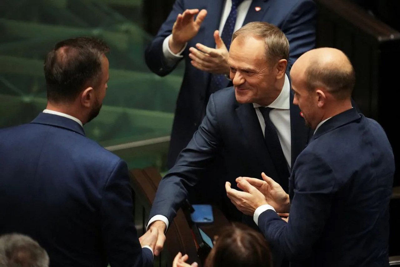 Poland embarks on new era with pro-EU Tusk as PM