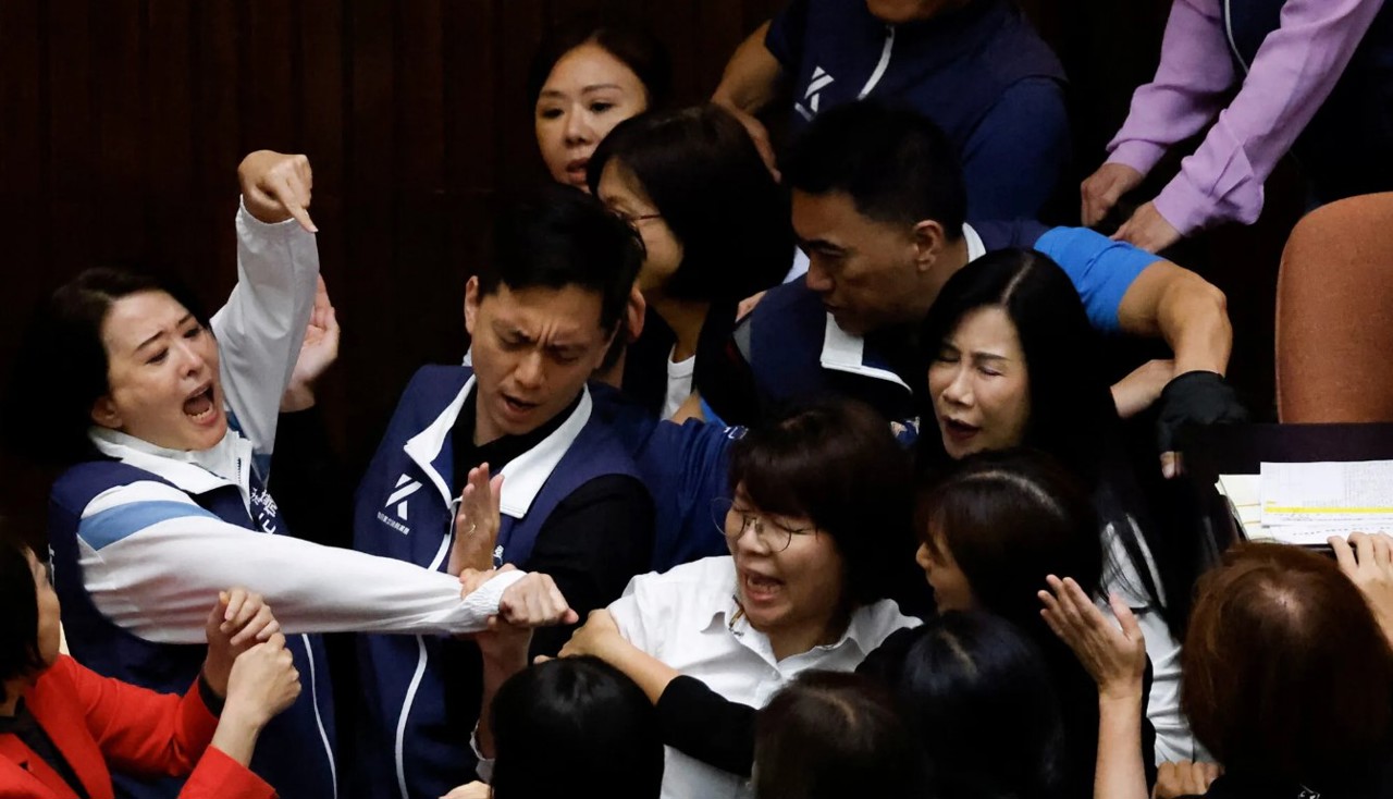 Taiwan’s parliament descends into chaos and punch-ups between MPs in ugly scenes during debate
